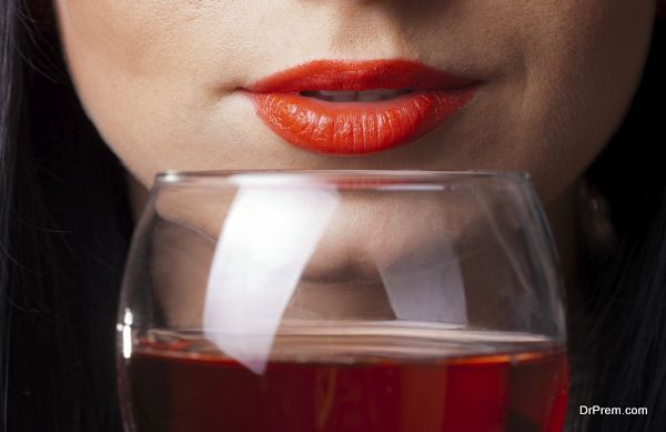 Red lips and glass of wine