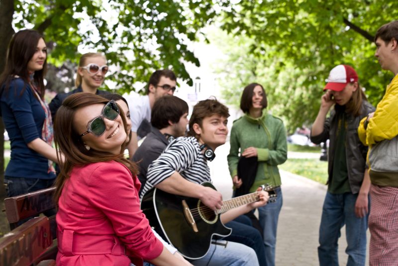 music with friends in a park